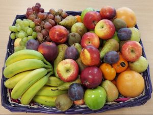 Staff receive fruit basket